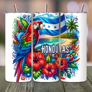 May include: White tumbler with a colourful design depicting a parrot, hibiscus flowers, and the Honduran flag. The word "HONDURAS" is displayed. The design includes a beach scene with palm trees and ocean waves.
