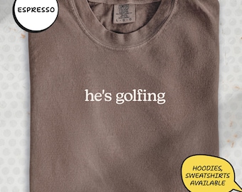 He's Golfing Comfort Colors® Shirt, Golf Player Wife Mom Tee