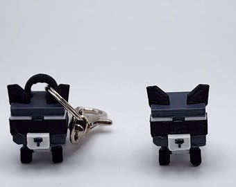 Llavero y minifigura de mapache de Roblox "Cultiva un jardín"