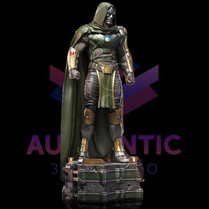 May include: A detailed statue of Doctor Doom, a Marvel Comics supervillain. The figure is clad in green and gold armor, a green hooded cloak, and a silver mask. The statue stands on a textured base.