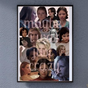 May include: A framed poster featuring a collage of images of women. The text "maybe I just love crazy" is overlaid on the images. The poster is displayed on a blue wall.