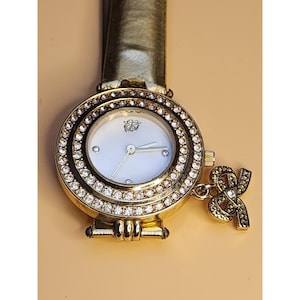 Vintage Watch NEW Elizabeth Taylor White Diamonds White Gold Tone CZ Bow Charm Elizabeth Taylor White Diamonds quartz watch | Mercari main image 4