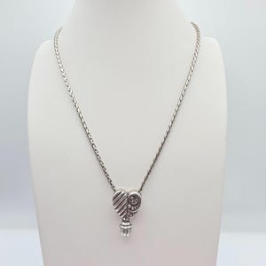 Collier BRIGHTON « Confit » Pendentif coeur à volutes réversible plaqué argent 18 po. image 3