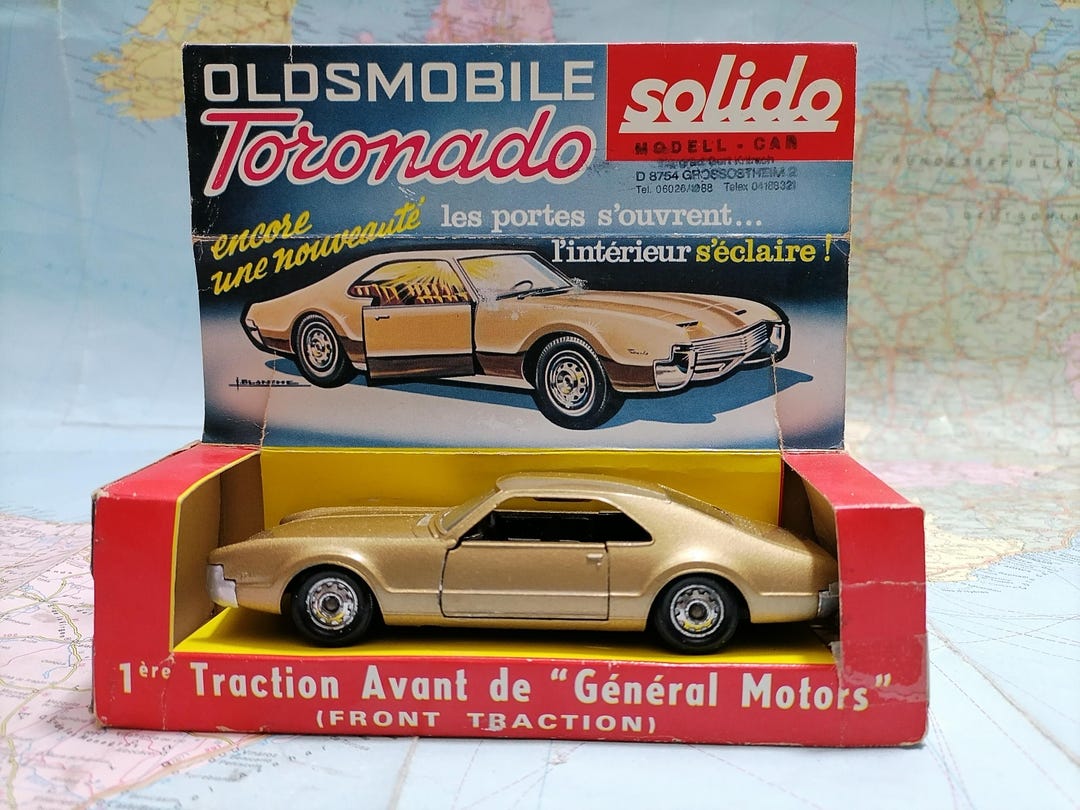 SOLIDO - Oldsmobile Toronado Tourisme métal doré, Ref : 150. - Dans sa boîte d'… - Boisgirard Antonini