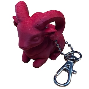 May include: A distressed wooden sign with the words "Welcome to our home" in white lettering. The sign has a rustic finish, ideal for adding a welcoming touch to any home's entrance.