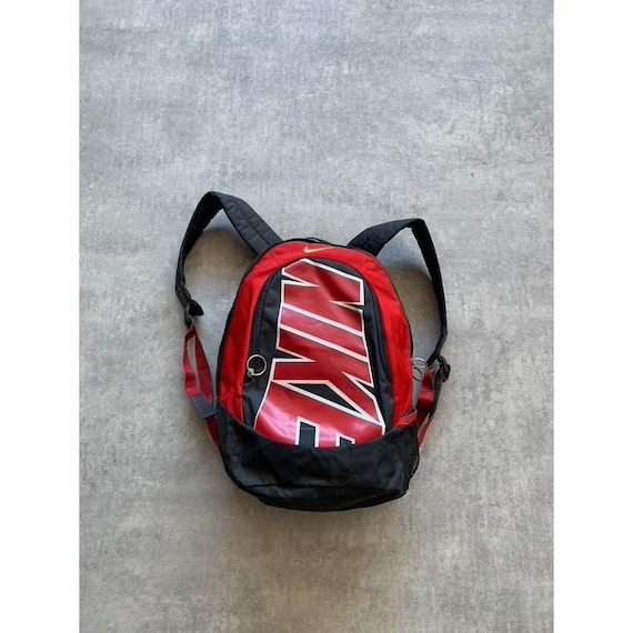 red and black nike backpack