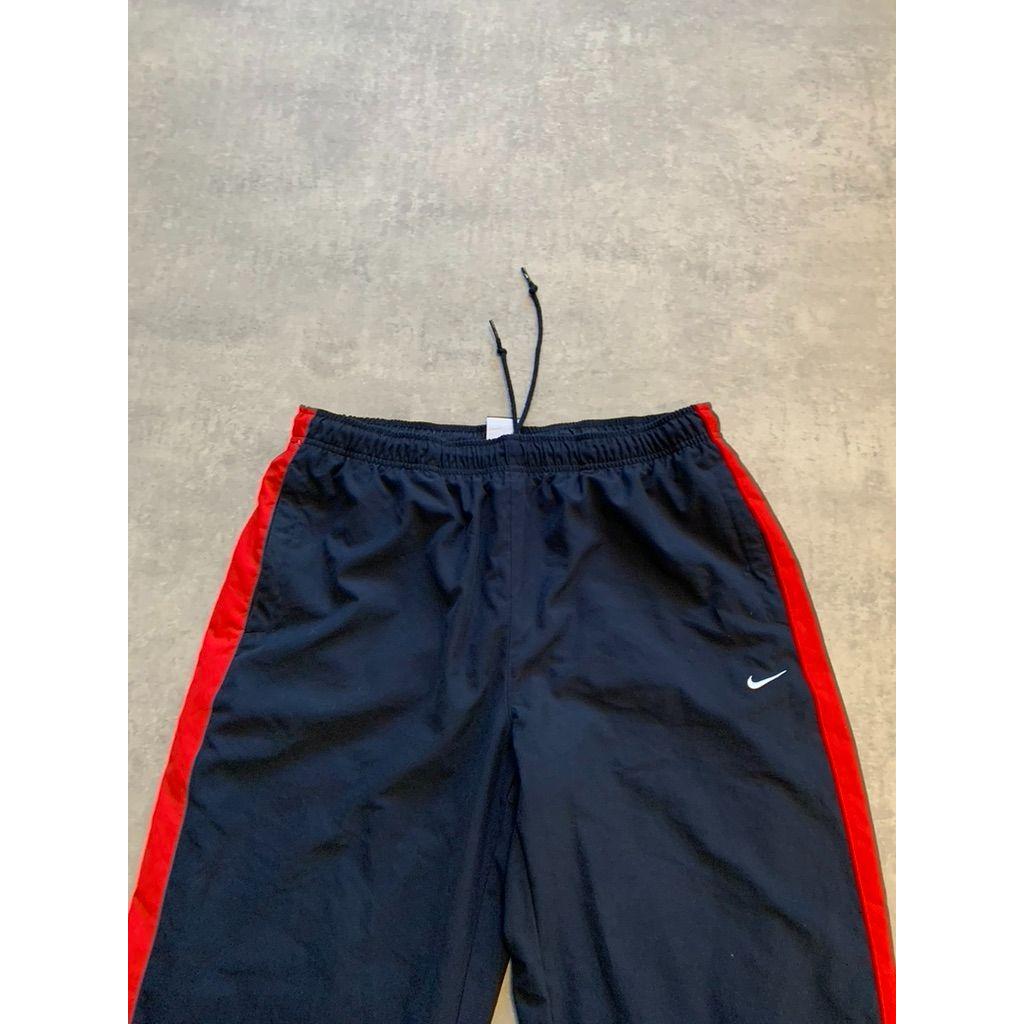nike track pants red stripe