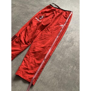 Pantalon D'entraînement AC Milan Homme – Coupe Technique, Légère, Respirante – Fermeture éclair Invisible, Genoux Articulés
