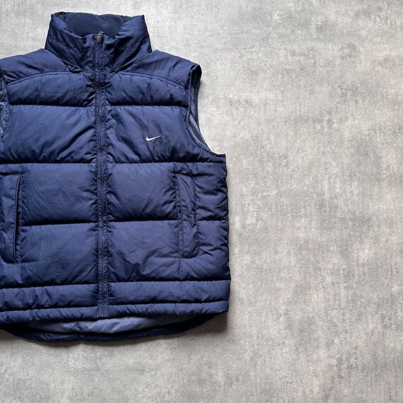 nike sleeveless jacket