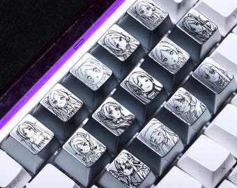 Juego de teclas de metal Frieren Beyond Journeys End de aleación de zinc grabada con láser, 14 diseños de personajes, teclas de teclado personalizadas, regalo de anime para coleccionistas.