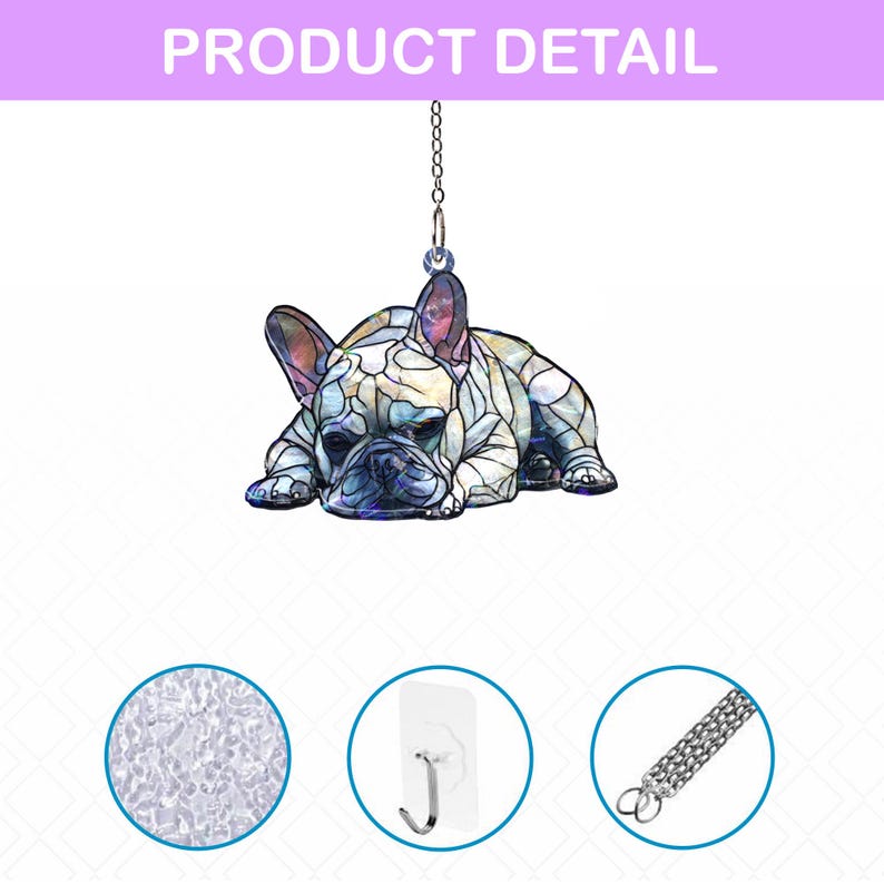 May include: A decorative hanging ornament featuring a French Bulldog in a stained-glass style design. The dog is lying down with its head resting on its paws. The ornament hangs from a silver chain. The text "PRODUCT DETAIL" is at the top.