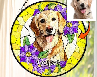 May include: Round stained glass window art featuring a Golden Retriever dog with purple flowers and the name "Cooper". The window has a yellow and white background with a black border and a hanging chain.