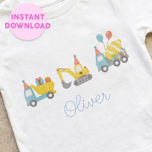 May include: A white t-shirt featuring an embroidered design of a blue dump truck, a yellow excavator, and a blue truck carrying a yellow striped egg, all wearing party hats. The design includes colorful gift boxes, balloons, and the name Oliver.