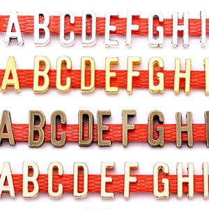 100 piezas 11 mm plata envejecida/bronce envejecido/oro/kc oro diapositiva letras del alfabeto encantos hallazgos colgantes--usted elige la letra que desea