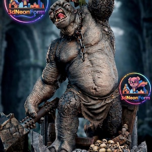 May include: A detailed statue of a troll from The Lord of the Rings, holding a large hammer. The gray figure has a chain around its neck and is mounted on a stone base with skulls. A figure with a bow and arrow is on the troll's shoulder.