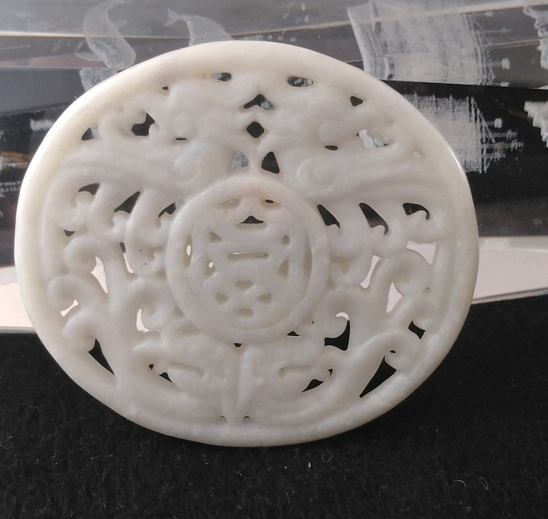 Beautiful Carved Oval Natural White Jade Dragon Pendant Beautiful Carved Oval Natural White Jade Dragon Pendant