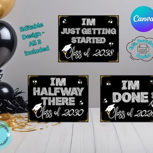 May include: Three black graduation signs with white text: "I'M JUST GETTING STARTED Class of 2038", "I'M HALFWAY THERE Class of 2030", and "I'M DONE Class of 2026". Gold and black balloons and confetti are in the background.
