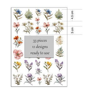 Op de afbeelding: Een vel bloemenstickers met 33 stuks en 12 ontwerpen. De stickers tonen verschillende bloemen en varens in roze, oranje, geel, blauw en paars. Het vel meet ongeveer 4,5 cm bij 3 cm.