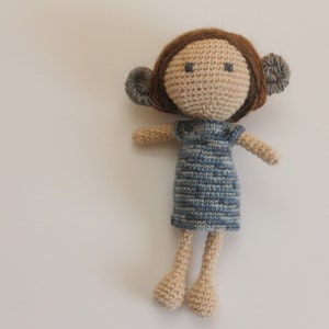 crochet doll pattern with unique hair and dress image 1