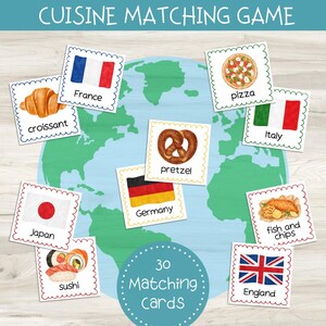 May include: A Cuisine Matching Game set featuring 30 square cards with scalloped edges. Each card displays a watercolor illustration of a food item or a national flag with its corresponding name, including France, Italy, Germany, Japan, and England.