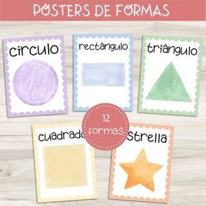 May include: Educational posters with watercolor shapes: circle, rectangle, triangle, square, and star. Each shape is labeled in Spanish with a corresponding watercolor illustration. The posters have scalloped edges and are set against a light wood background.