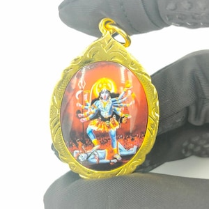 Kali Goddess Amulet Pendant - Hindu Talisman for Power and Protection Red Background