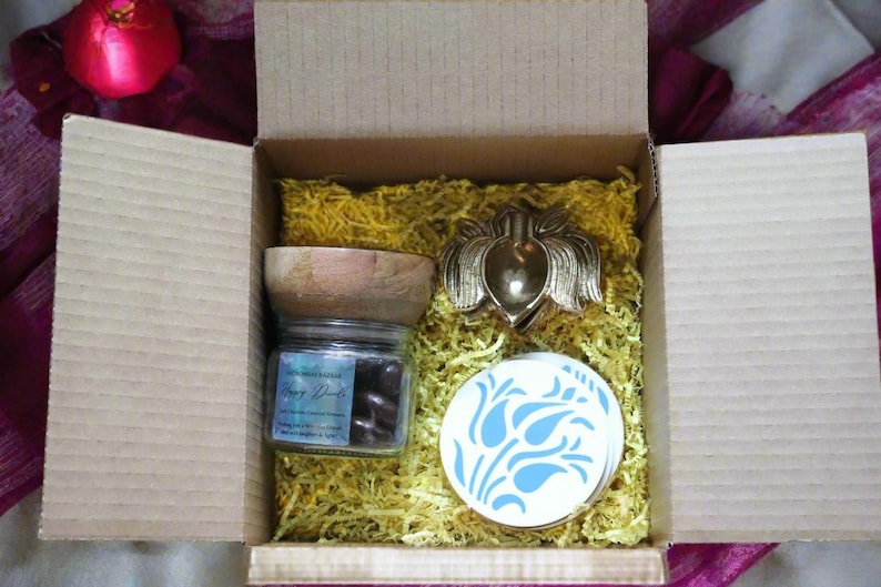 A box filled with Diwali gifts