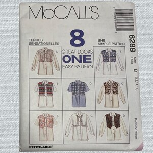 May include: McCall's sewing pattern featuring eight shirt designs. The pattern includes various styles with different embellishments, including lace, patterned fabrics, and a leopard print. The size is D (12,14,16).