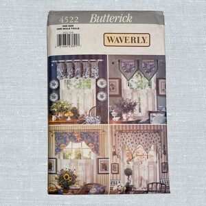 May include: A vintage Butterick sewing pattern envelope featuring Waverly designs. The pattern, labeled 4522, showcases various curtain styles with floral and patterned fabrics. The envelope displays multiple window treatment examples.
