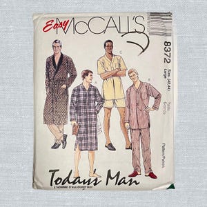 May include: A vintage McCall's sewing pattern titled "Today's Man." The pattern features illustrations of men's sleepwear and robes in various styles. The cover is cream-colored with the text "Easy McCall's" in red.