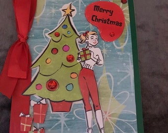 1950's style girl with gifts and tree christmas card