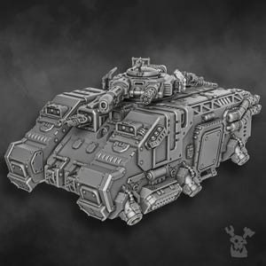 May include: A gray, detailed model of a tank with multiple turrets, guns, and intricate mechanical components. The tank has a boxy design with visible rivets and panels, suggesting a futuristic or industrial theme. The image is a studio shot with a dark background.