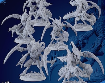 May include: A collection of six detailed, gray miniature figures of alien creatures with multiple limbs and sharp appendages. The figures are on circular bases, with the text "CHAMAKO PATREON" and "SUPPORTS READY" visible. The figures are 50 mm wide and 52 mm tall.