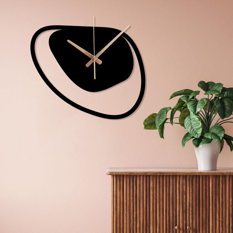Contemporary designer wall clock with geometric shape