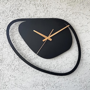 Modern abstract black metal wall clock