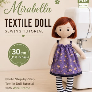 May include: A Mirabella textile doll sewing tutorial PDF pattern featuring a doll with auburn hair, a purple floral dress, and black and white striped leggings. The doll stands 11.8 inches tall. The text reads Mirabella Textile Doll Sewing Tutorial.