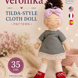 Può includere: Un cartamodello per bambola di stoffa intitolato Veronika Tilda-Style Cloth Doll Pattern. La bambola ha capelli castano scuro raccolti in uno chignon, una fascia viola chiaro, un vestito grigio a righe con pizzo, mutandoni rosa chiaro e scarpe rosse.