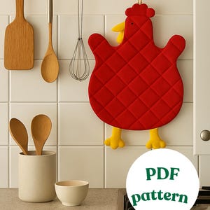 May include: A red quilted chicken-shaped pot holder with yellow feet and beak hangs on a white tiled wall. Kitchen utensils, including a wooden spoon and spatula, are also visible. The image includes the text "PDF pattern".