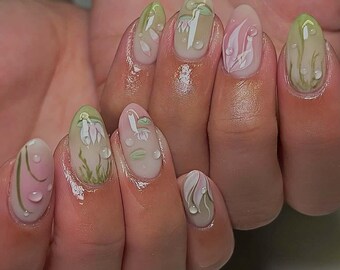 Uñas postizas verdes 3D: acrílicas almendradas largas, pintadas a mano