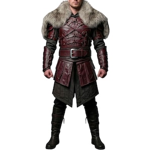May include: A burgundy leather and fur costume with a silver buckle belt. The costume includes a fur collar, leather armor, and matching boots. The outfit is designed with intricate details and a medieval aesthetic.