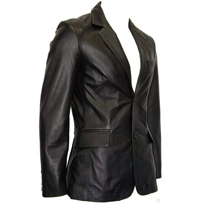 May include: A black leather blazer with a notched lapel, single-button closure, and a chest pocket. The jacket has a tailored fit and a classic design. The blazer is made of a smooth, supple leather.