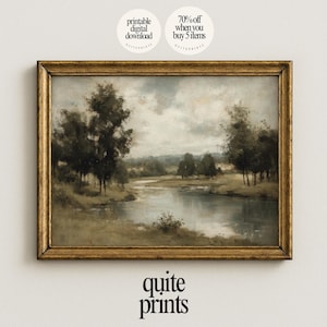May include: A framed landscape painting in a gold-coloured frame. The artwork shows a tranquil river scene with trees and a cloudy sky. The text "printable digital download" and "70% off when you buy 5 items" are in the upper corners. The words "quite prints" are at the bottom.