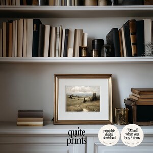 Framed printable Vintage Botanical Meadow Oil Painting artwork in a little frame near a bookshelf | Digital download wall art with Soft tones | Vintage Vintage house poster print