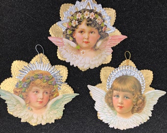 ANGEL WINGS ROBE GIFTS HOLLY CARD VICTORIAN EMBOSSED GERMAN PAPER SCRAP CARD