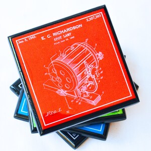 May include: A red square coaster with a black border features a vintage patent drawing of a spot lamp. The patent number 2,307,301 and the inventor's name E. C. Richardson are printed in white. The text "Jan. 5, 1943. Filed June 18, 1940" is also printed in white.