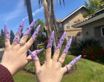 Garras de dedos intrincadas de fantasía