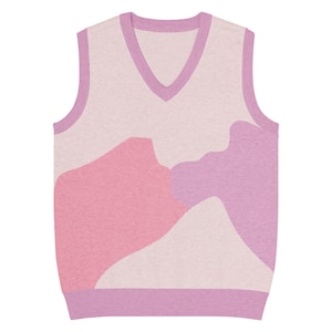 May include: A sleeveless knitted vest with a V-neck. The vest has a light pink base, with abstract pink and purple shapes. The neckline, armholes, and hem are trimmed in a darker purple colour.
