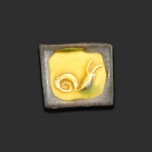 Snail porcelain brooch