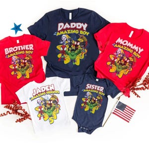 May include: A set of three ceramic mugs with a speckled, matte finish. The mugs are in shades of cream, light gray, and dark gray. Each mug has a simple, minimalist design, perfect for coffee or tea.