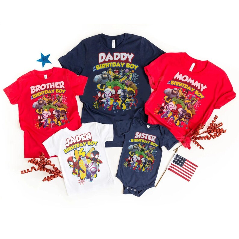 May include: A collection of family birthday shirts in red, navy blue, and white. The shirts feature a colorful graphic of superheroes and the phrases "Daddy Birthday Boy", "Mommy Birthday Boy", "Brother Birthday Boy", "Jaden Birthday Boy", and "Sister Birthday Boy".